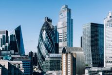 Modern skyscrapers in City of London on a sunny day with clear blue sky