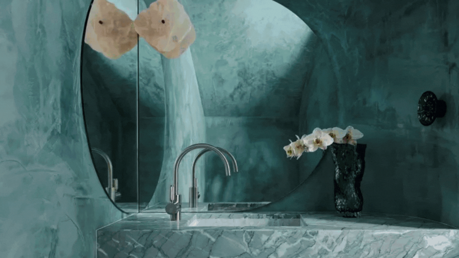 gif of teal marble bathroom, living room with teal sofa and teal green marble with burgundy walls, beige living room with milk chocolate sofas, and matcha green bathroom with bright paint and tiles and built-in bath