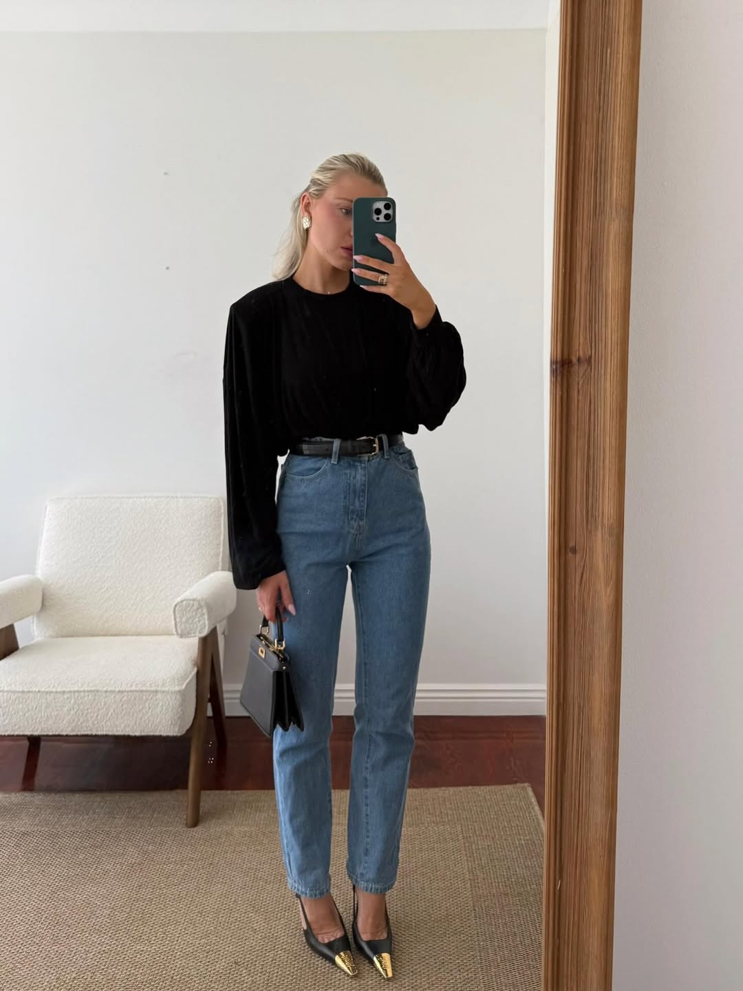 Laura Jade Stone wearing Saint Laurent Jeanne slingback pumps with gold toes.