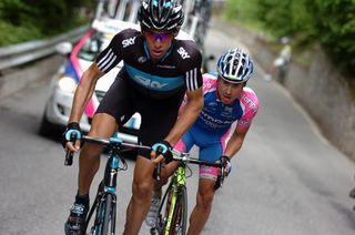 Dario David Cioni (Sky) and Damiano Cunego (Lampre - Farnese Vini) climb to the finish in Aprica.