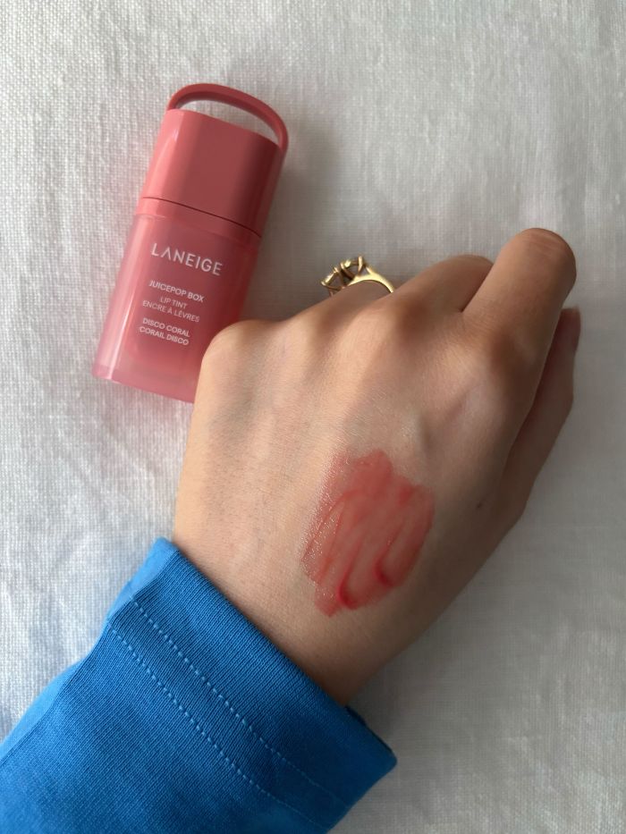 Deputy beauty editor Grace Lindsay swatching the Laneige JuicePop Box Lip Tint