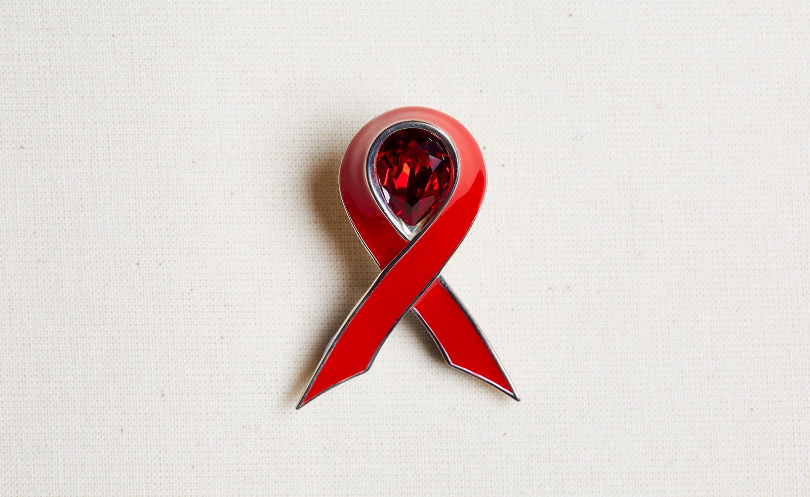 red ribbon brooch by Shaun Leane for World AIDS Day 2023