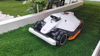 LUBA mini AWD LiDAR robot mower on a demo lawn