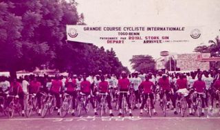 Athletes line up at the start of the 1983 Togo-Benin International Cycling Classic.