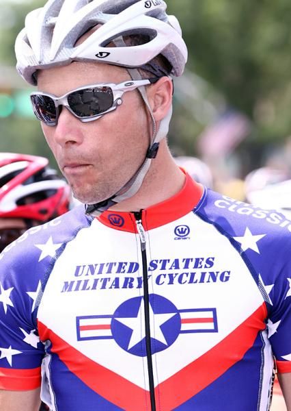Chuck Hutchinson (US Military Cycling Team) proudly helps his team celebrate the holiday.