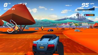 A blue cars drifts around a corner in a desert landscape