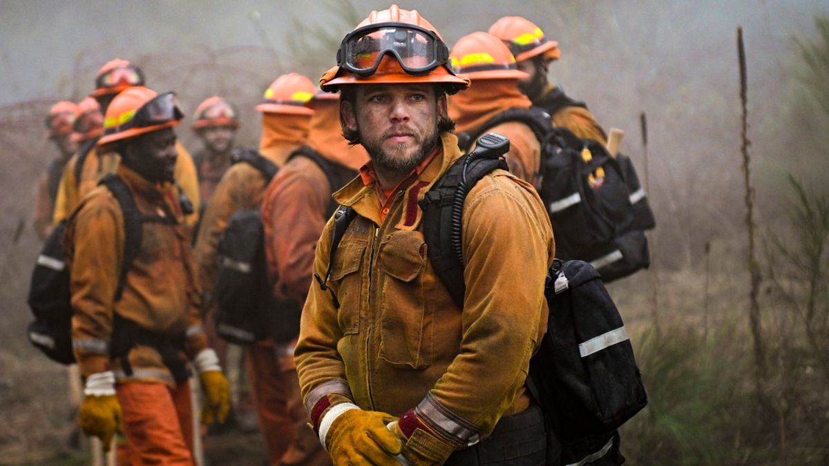 Max Thieriot standing in her fire gear in Episode 16 of Fire Country