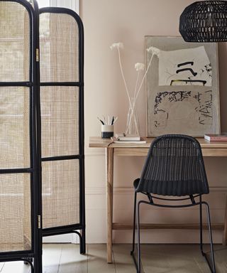 Rattan room divider in home office by Habitat