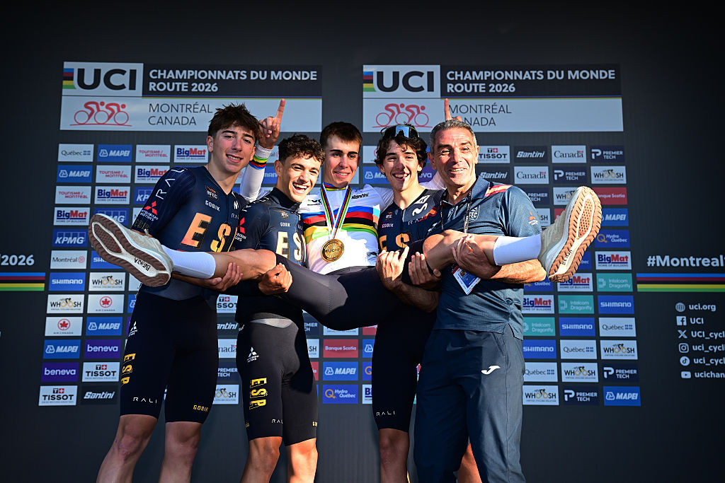 Gold medalist Benjamin Noval and  Spanish Junior's Coach, Eleuterio "Lute" Anguita (Right) after 2026 UCI Road World Championships Montreal 2026, Men Junior Road Race in Montreal, Quebec. (Photo by Tim de Waele/Getty Images)