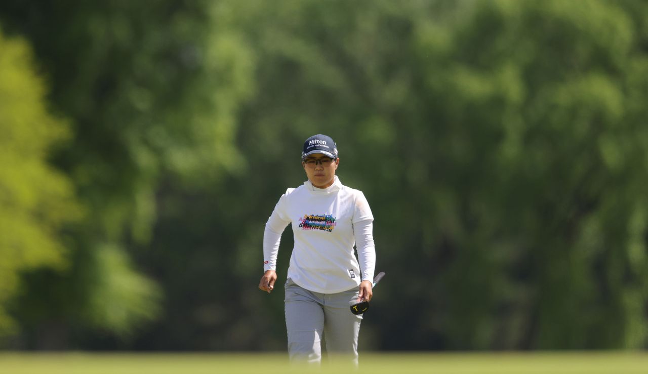 Nasa Hataoka walks on the green after hitting her second shot close