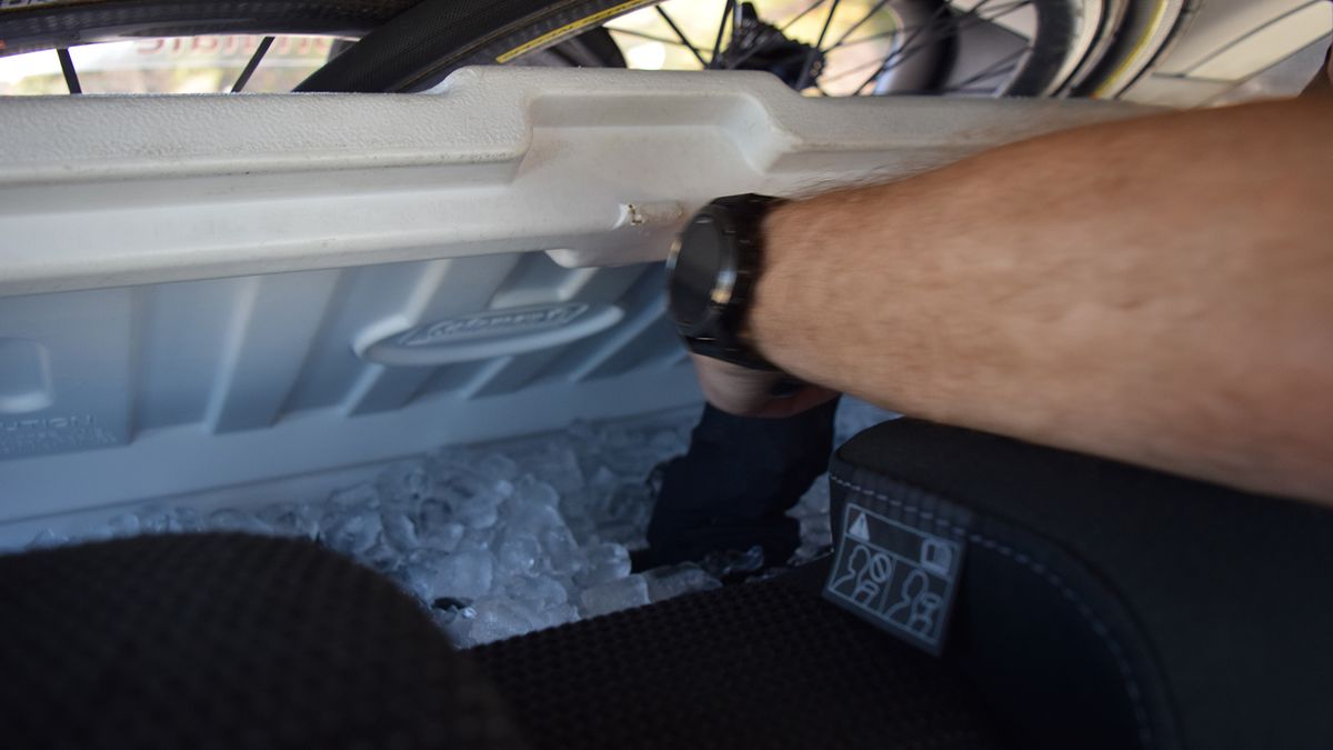 A huge cooler chest stored enough bidons for half the stage, along with plenty of ice