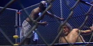 Kamala and Andre the Giant in a steel cage match