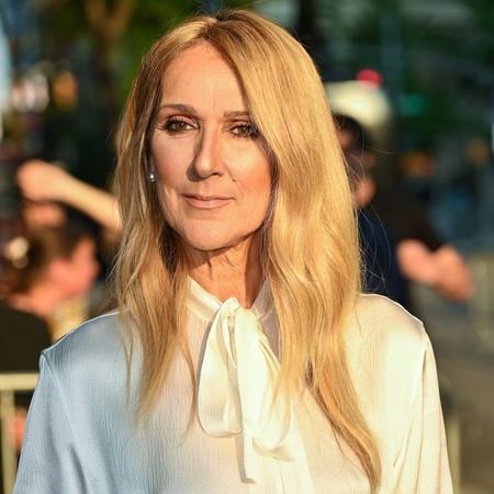 C&eacute;line Dion wearing a white button down blouse tucked into a matching maxi skirt at the 'I Am: Celine Dion' New York premiere June 2024
