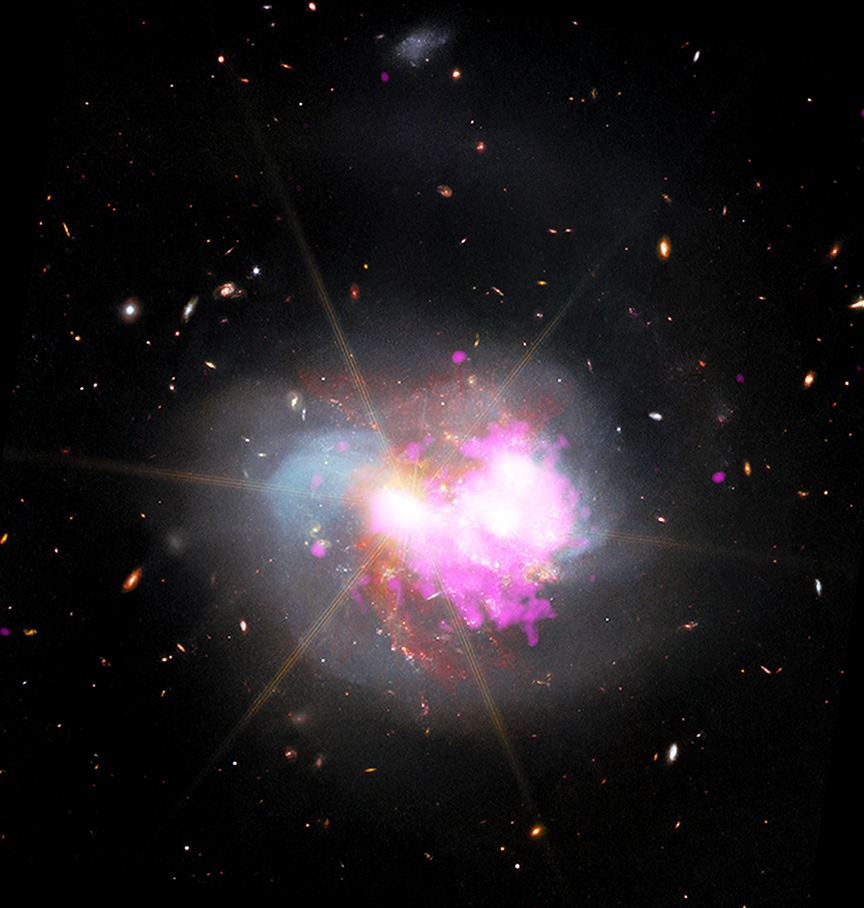 a cloud of white and pink gas on a starry background