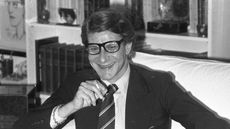 fashion designer yves st. laurent in black and white