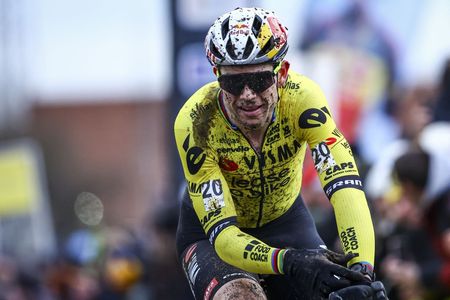 Wout van Aert celebrates as he wins the men's elite Superprestige cyclocross round in Gullegem