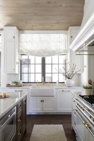 Modern farmhouse kitchen with wooden ceiling by Marie Flanigan
