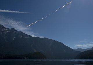 A view of the Aug. 21, 2017, total solar eclipse over Ross Lake in Washington's North Cascades National Park.