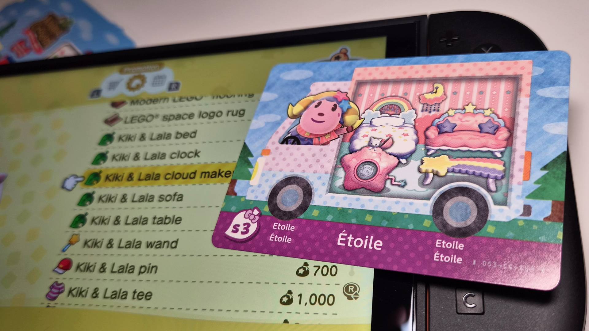Photo of an Animal Crossing amiibo card sitting on a Nintendo Switch 2.