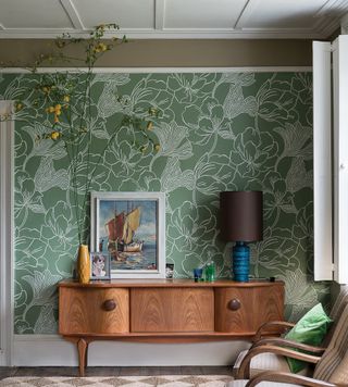 Farrow & Ball green wallpaper in a mid-century style living room