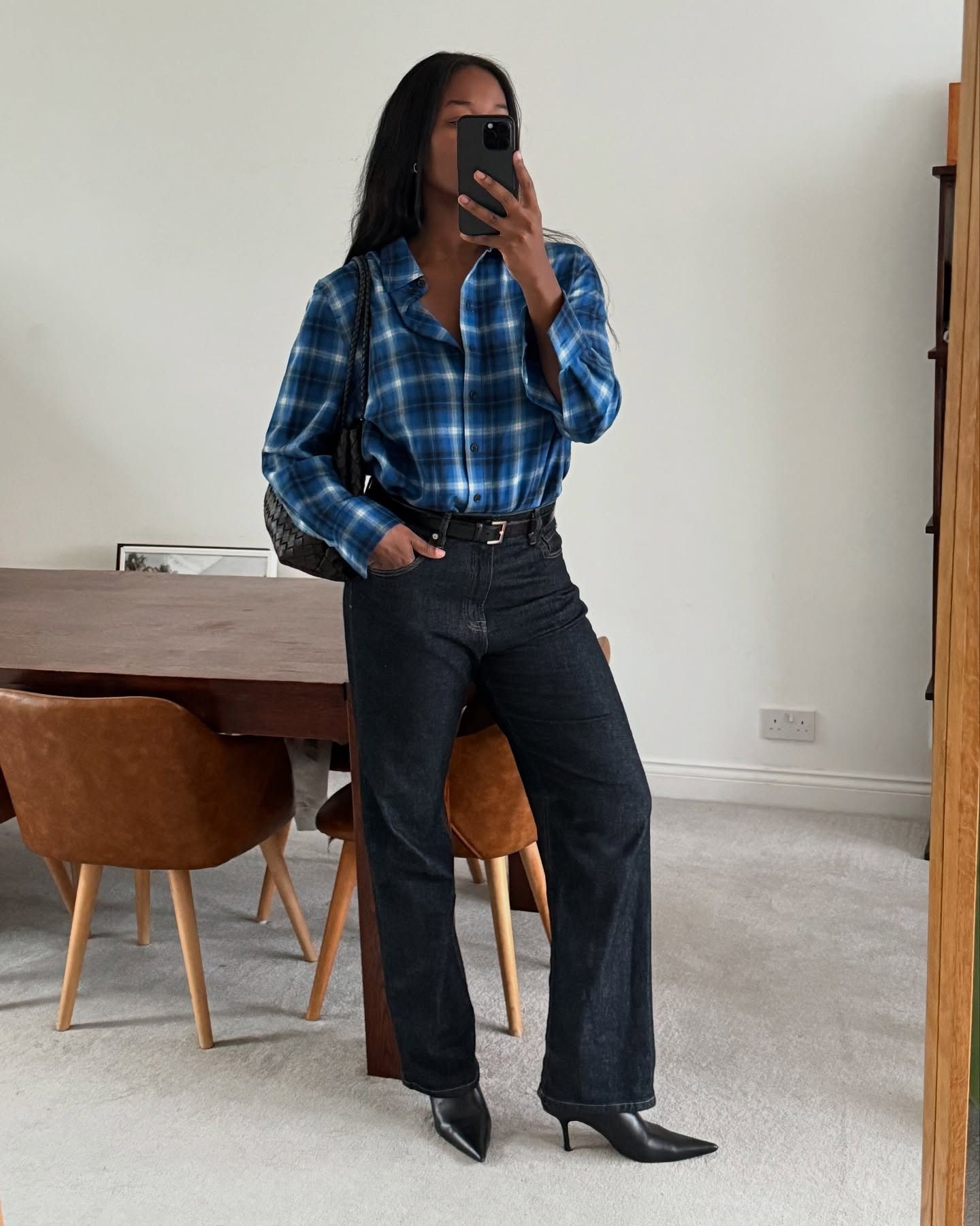 @nlmarilyn wearing jeans and boots