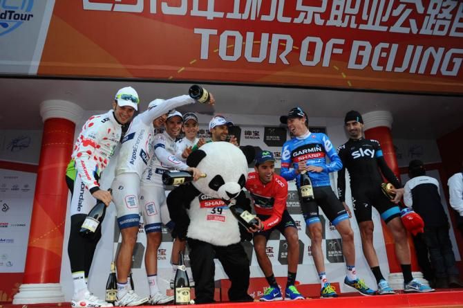 The Beijing podium finishers party with the panda