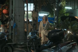 Alice walks through Bangkok, Thailand in The Night Agent season 2