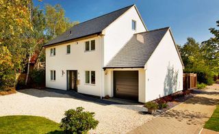 Modern energy efficient self build with white render