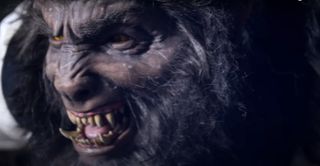 The Wolf Man snarls during an animatronic test for Monsters Unchained: The Frankenstein Experiment.