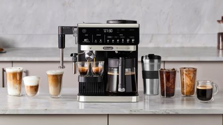 De'Longhi All-in-One Combination Coffee & Espresso Machine with coffee drinks on kitchen counter