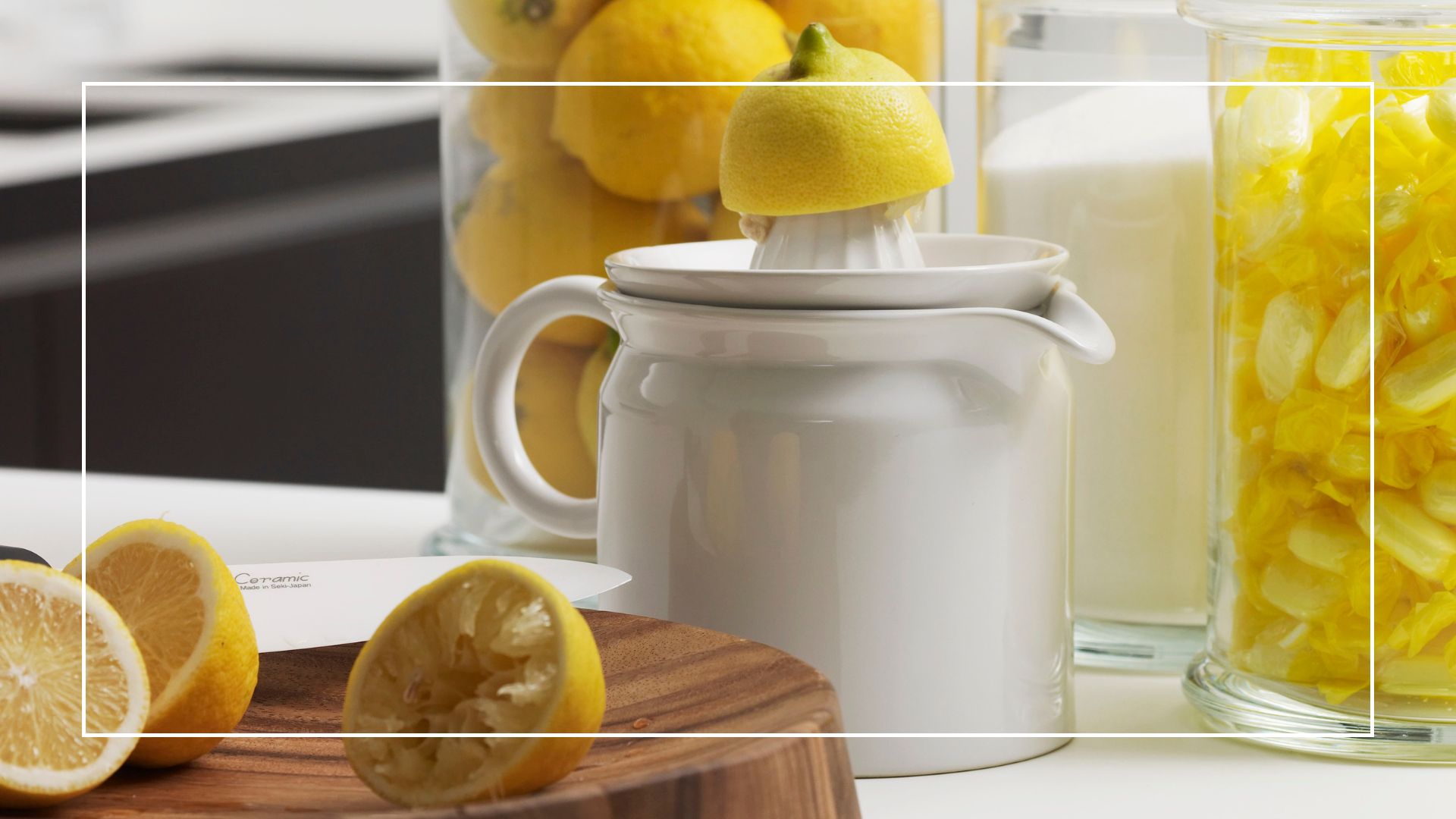 Used lemons on a chopping board after being squeezed on a juicer
