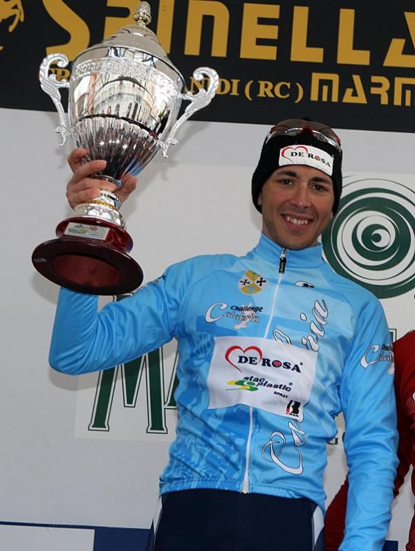 Matteo Montaguti (De Rosa - Stac Plastic) celebrates his general classification victory on the podium.
