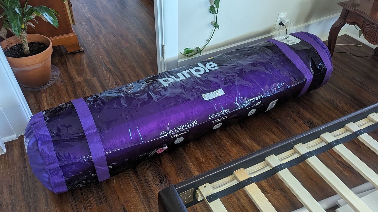 PurpleFlex mattress, vacuum-packed and rolled in a reusable plastic bag