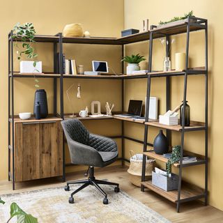 home office with chrome yellow wall storage shelve and chair