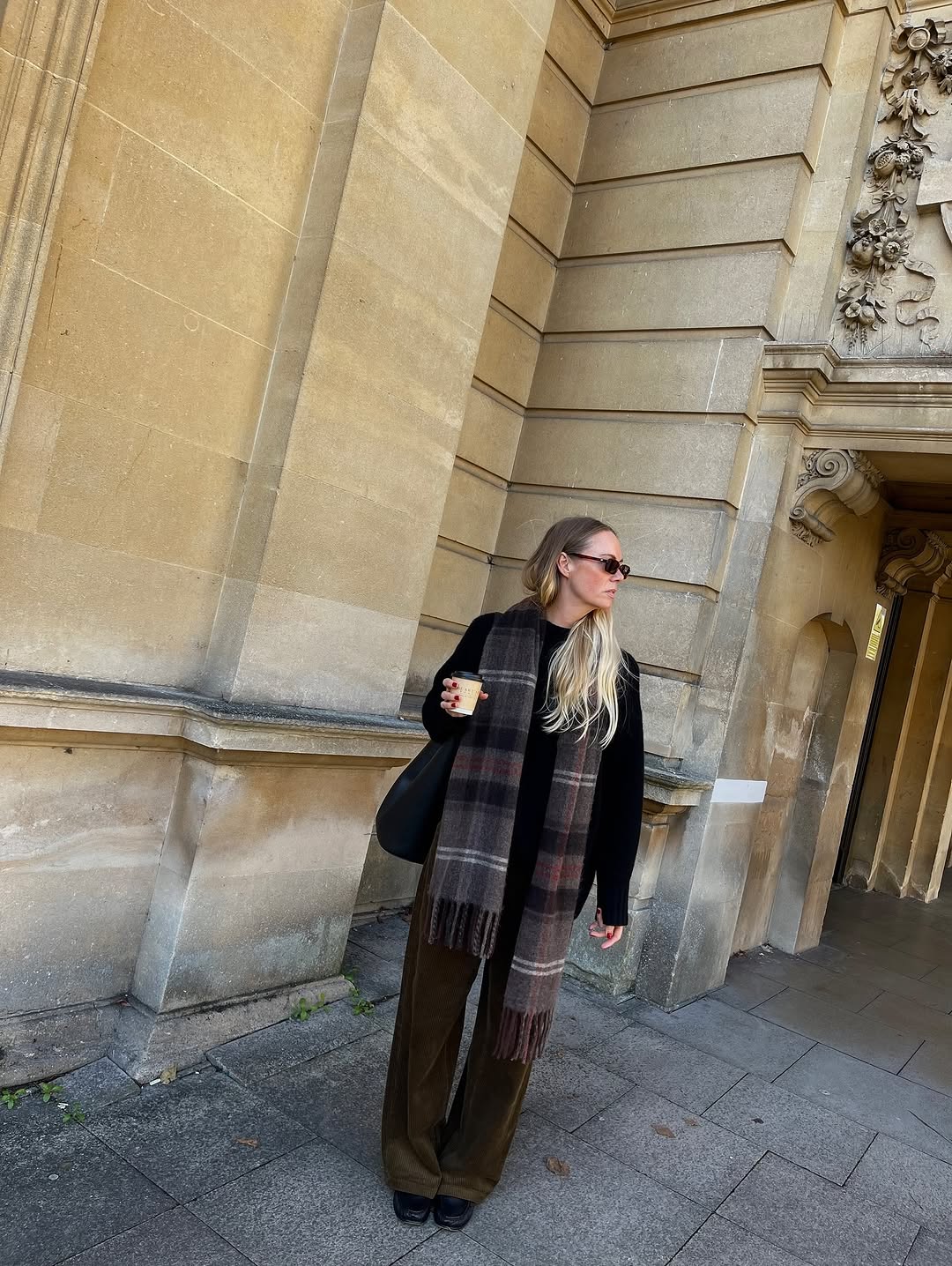 woman wearing winter scarf outfit 2025