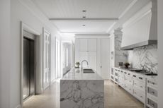 A kitchen with double sinks