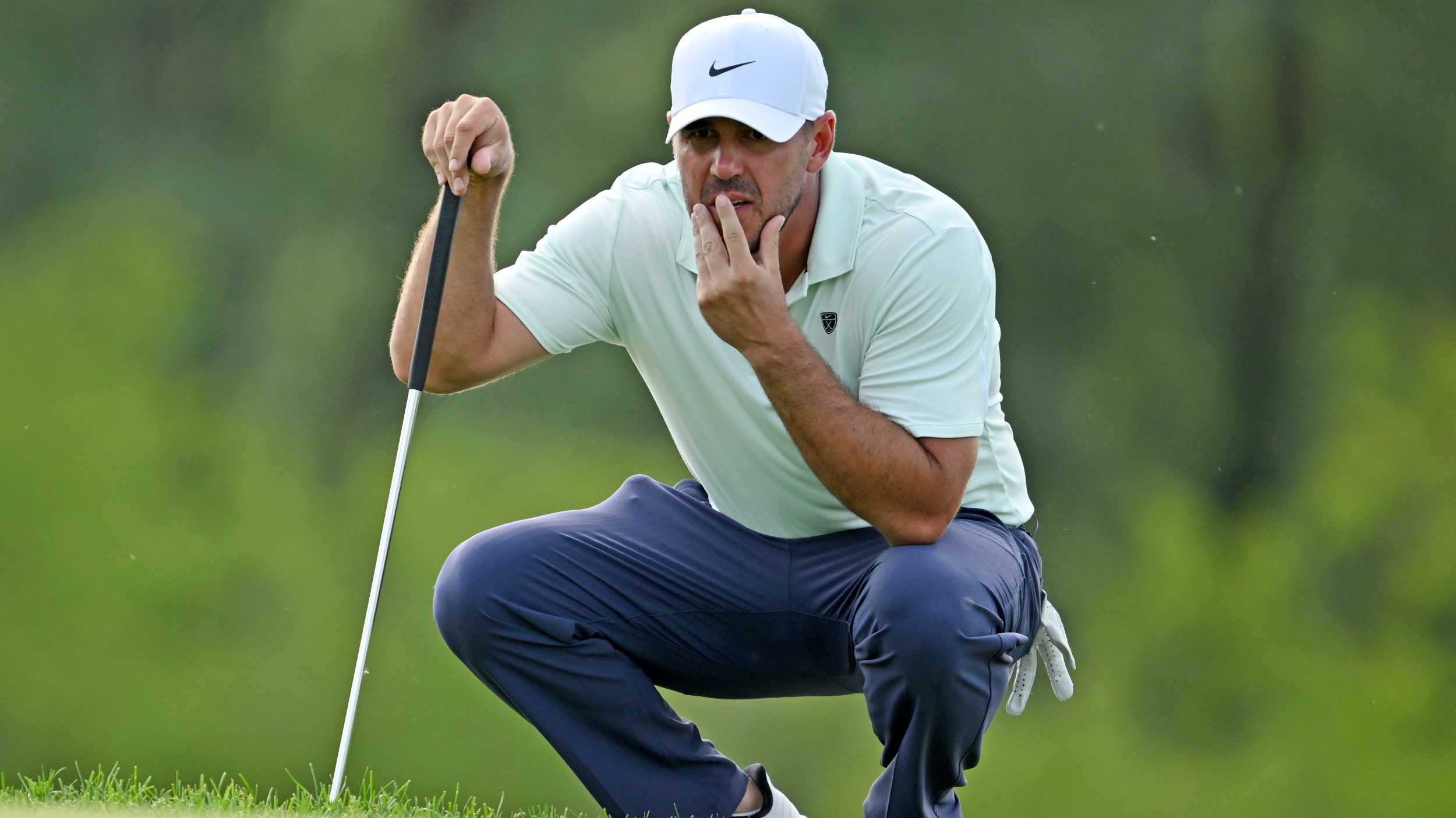 Brooks Koepka lines up a putt during the RBC Canadian Open