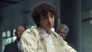 Boy at the negotiation table with Weyland/Yutani