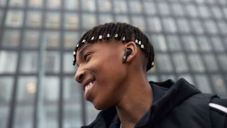 Man wearing Adidas Z.N.E. 01 Wireless Headphones