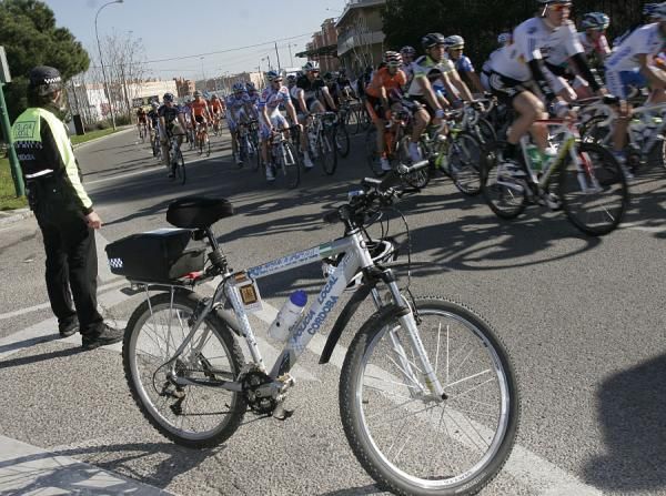 A policeman surveys the action at the Ruta del Sol.