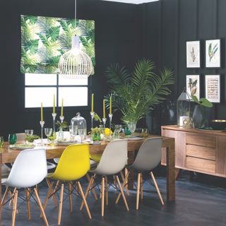dining room with black painted walls
