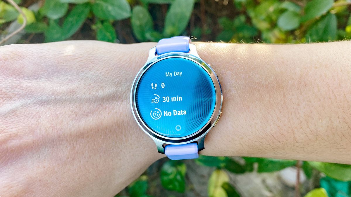 The Garmin Lily 2 Active in lilac on a user's wrist
