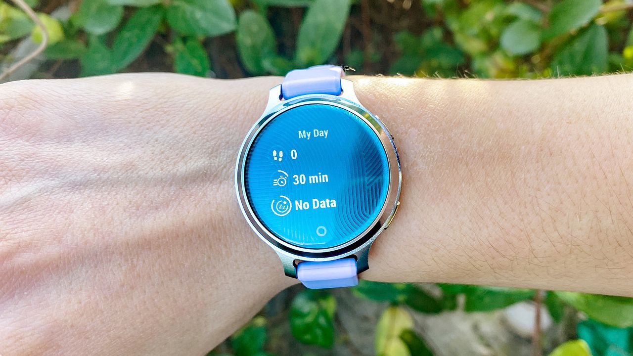The Garmin Lily 2 Active in lilac on a user's wrist
