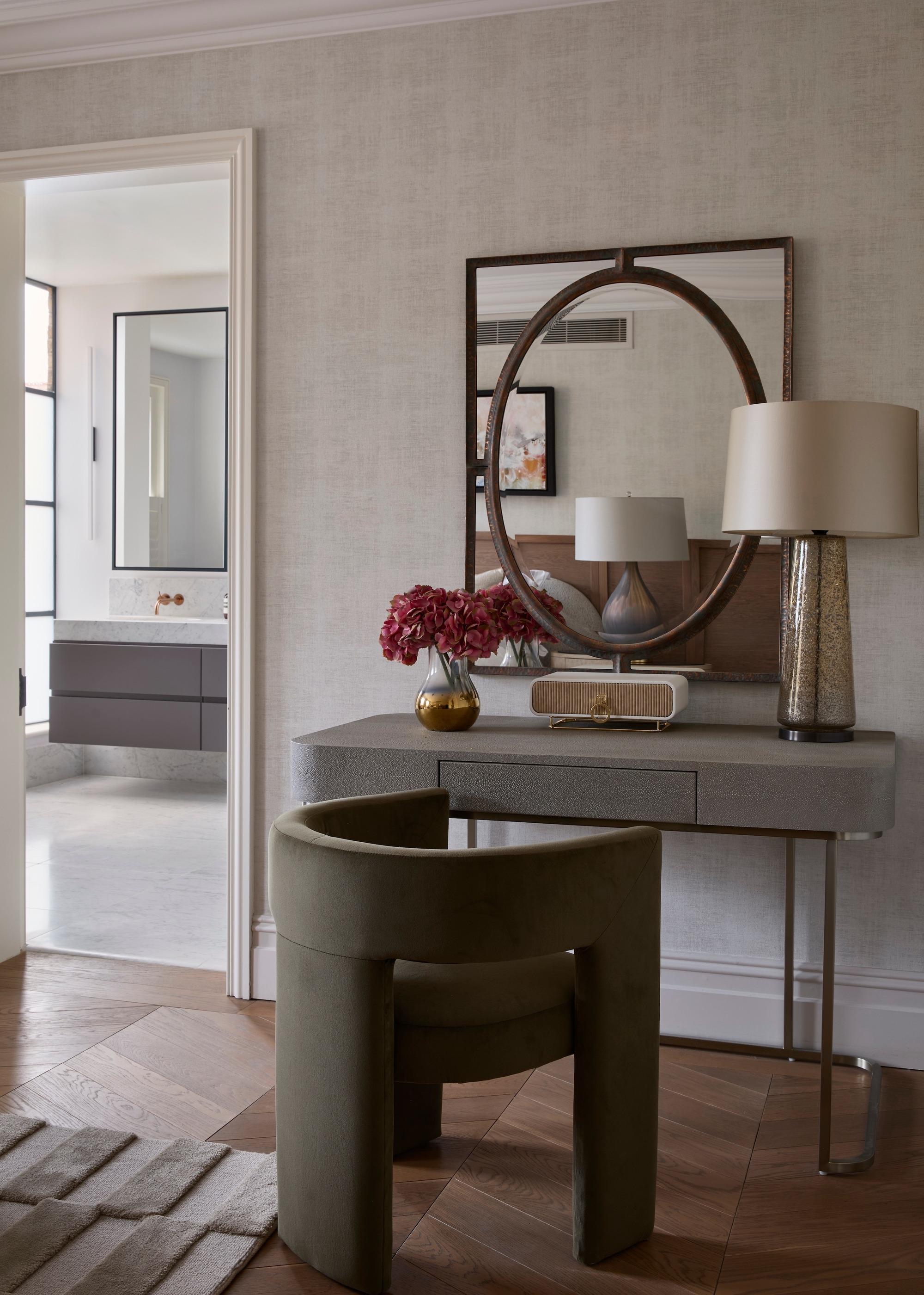 console in hallway next to doorway to bathroom