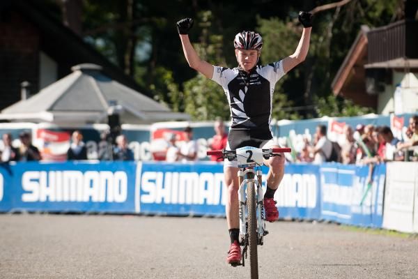 Anton Cooper (New Zealand) triumphs in the junior world championship race in Saalfelden, Austria