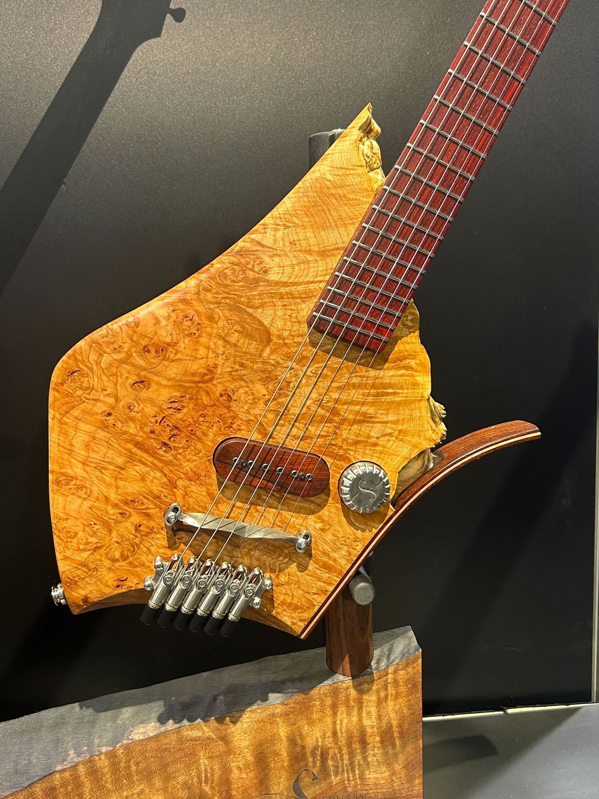 Four of the guitars displayed at the Boutique Guitar Showcase at the 2025 NAMM Show in Anaheim, California