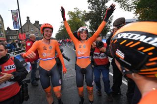 Riejanne Markus, Lucinda Brand and Amy Pieters celebrate after the finish