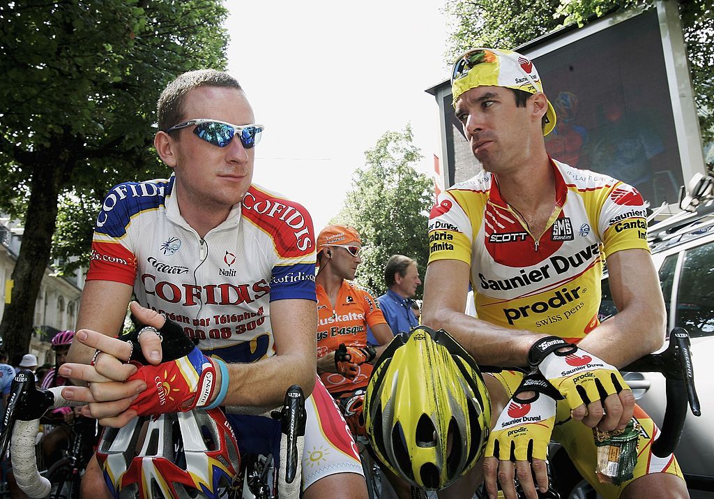 LUCHON FRANCE JULY 14 Bradley Wiggins of Great Britain and Cofidis L chats to compatriot David Millar prior to stage 12 of the 93rd Tour de France on July 14 2006 from Luchon to Carcassonne France Photo by Bryn LennonGetty Images