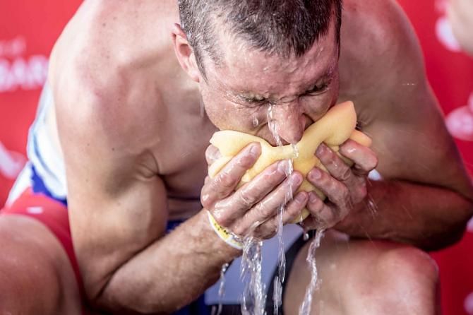 Christoph Sauser cleans up after the win