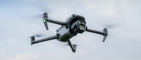 DJI Mavic 3 Pro-Drone in flight (21 by 9 format).